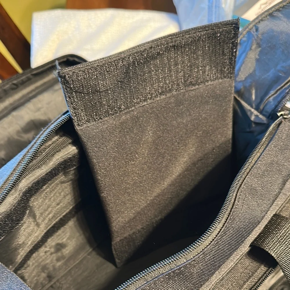 Black Duffel Bag with Rigid Structure and Durable Fabric